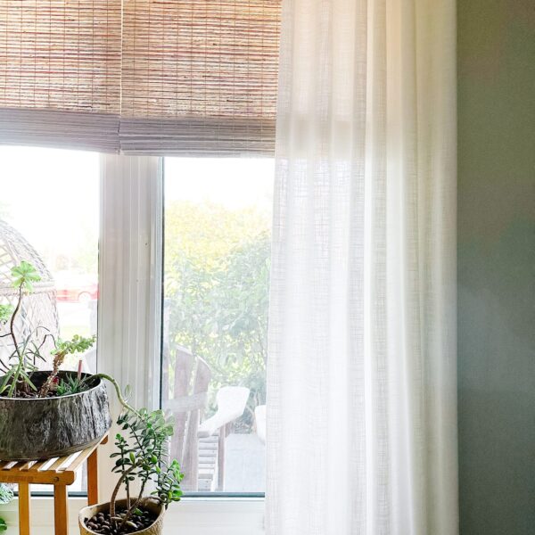 Toronto sheer curtains filtering natural light in a bright living room