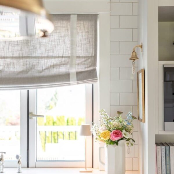 Cozy Linen Roman Shade closed, with white ribbon inset